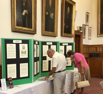 Visitors reading research into the family history of past Deal Mayors at Deal Town Hall