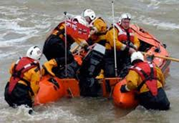 Lifeboat crew in action